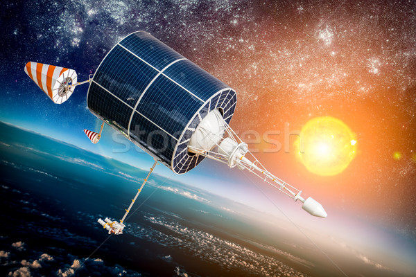 Space satellite over the planet earth Stock photo © cookelma