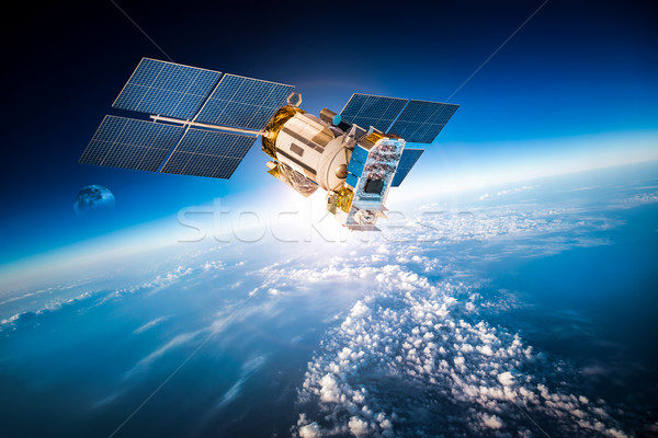 Space satellite over the planet earth Stock photo © cookelma