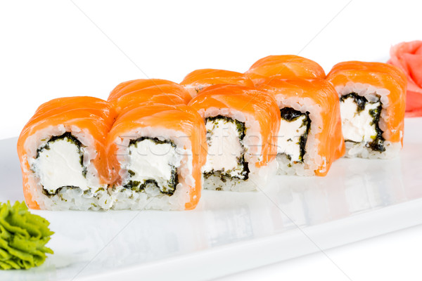 Sushi (Roll unagi maki syake) on a white background Stock photo © cookelma