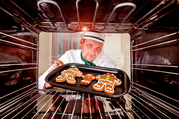 Baking Gingerbread man in the oven Stock photo © cookelma