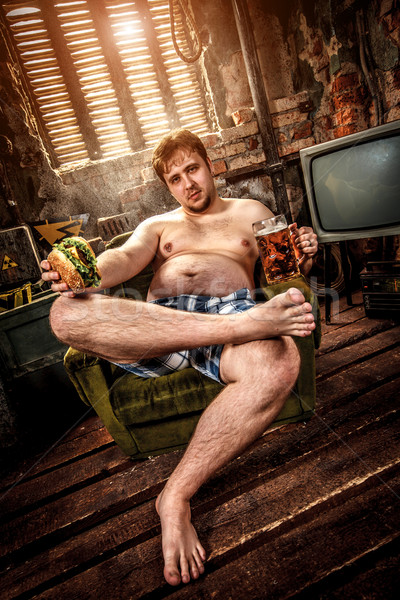 太った男 食べ ハンバーガー 座って 椅子 食品 ストックフォト © cookelma