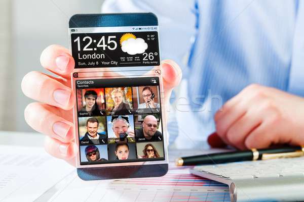 [[stock_photo]]: Smartphone · transparent · écran · humaine · mains · futuriste