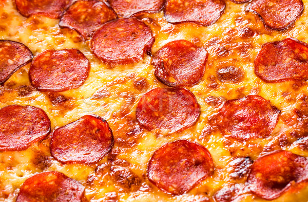 Pepperoni pizza iştah açıcı doldurma çerçeve Stok fotoğraf © cookelma