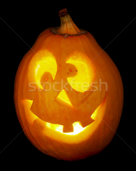 scary old jack-o-lantern on black. Stock photo © cookelma