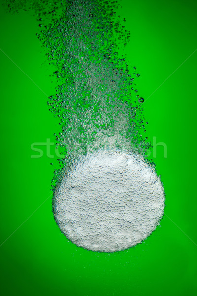 Tablet in a water glass Stock photo © cookelma