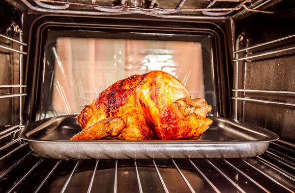 Pieczony kurczak piekarnik widoku wewnątrz gotowania dziękczynienie Zdjęcia stock © cookelma