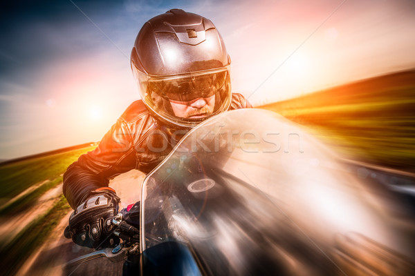 Stock fotó: Motoros · versenyzés · út · sisak · bőrdzseki · férfi