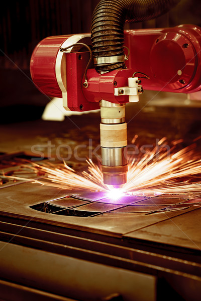 CNC Laser plasma cutting of metal, modern industrial technology. Stock photo © cookelma