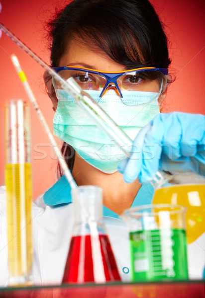 scientist in laboratory with test tubes  Stock photo © cookelma