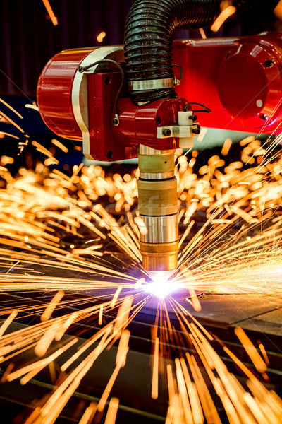 CNC Laser plasma cutting of metal, modern industrial technology. Stock photo © cookelma