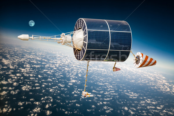 Space satellite over the planet earth Stock photo © cookelma
