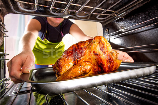 Kochen Huhn Ofen home Hausfrau Brathähnchen Stock foto © cookelma