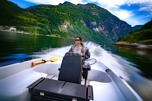 Frau fahren Motorboot schönen Natur Sonne Stock foto © cookelma