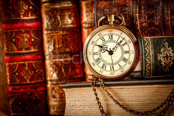 Stock photo: Old Books and Vintage pocket watch