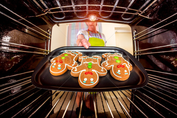 Stock photo: Baking Gingerbread man in the oven