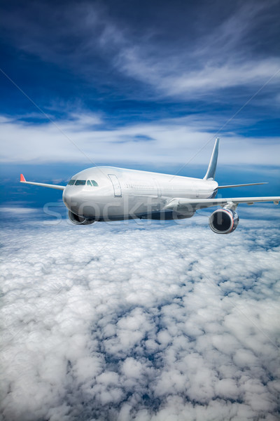 Passenger Airliner in the sky Stock photo © cookelma