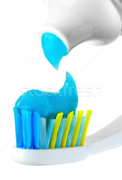 Dental brush and tube with paste. Stock photo © cookelma