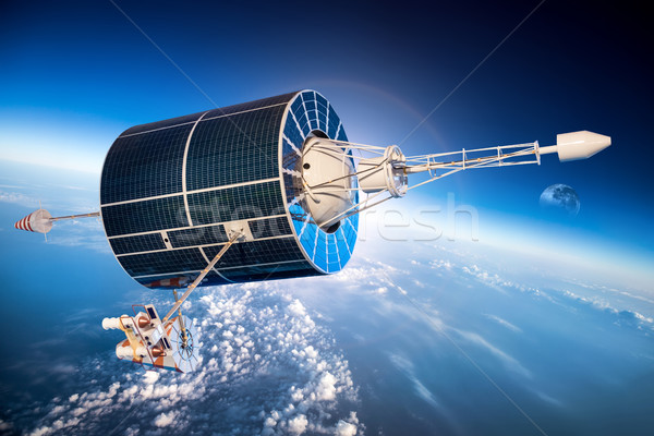Space satellite over the planet earth Stock photo © cookelma