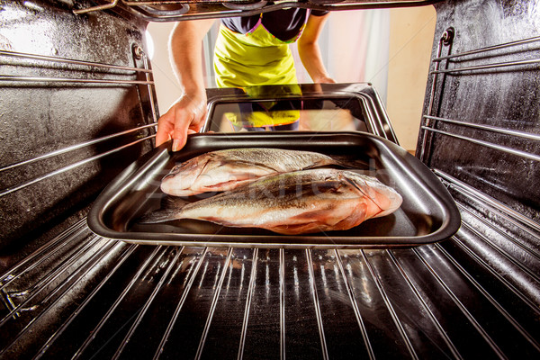 Cooking Dorado fish in the oven. Stock photo © cookelma