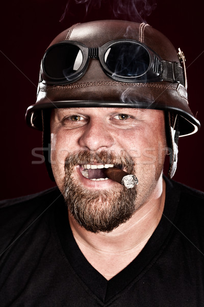 Motoros sisak szivar sötét arc portré Stock fotó © cookelma