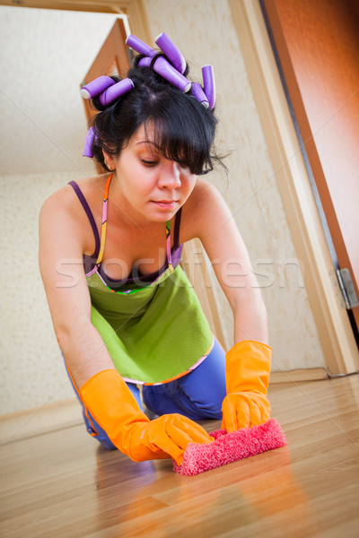 Stock photo: housewife washes a floor