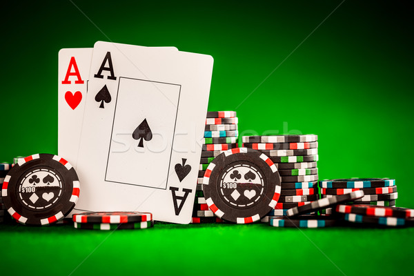 Stock photo: chips and two aces