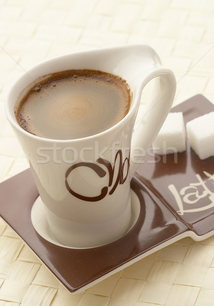 choco latte. A white cup of coffee on a support.  Stock photo © cookelma