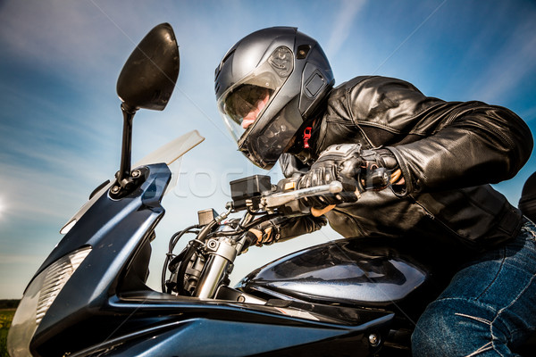 Corrida estrada capacete jaqueta de couro homem Foto stock © cookelma