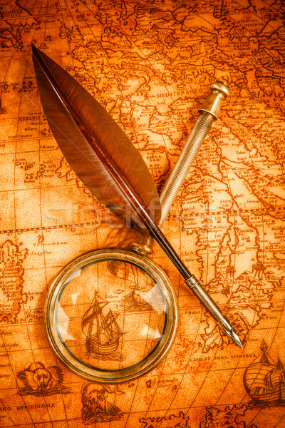 Vintage still life. Vintage items on ancient map. Stock photo © cookelma