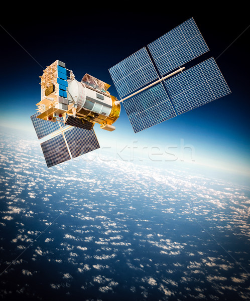 Space satellite over the planet earth Stock photo © cookelma