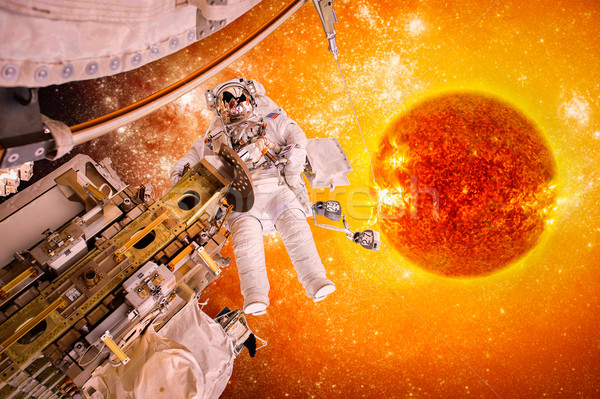 Spacecraft and astronauts in space on background sun star Stock photo © cookelma