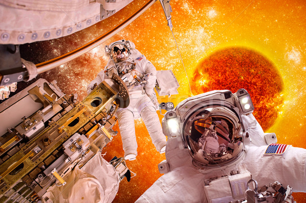 Spacecraft and astronauts in space on background sun star Stock photo © cookelma