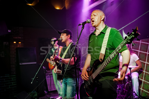 Band performs on stage in a nightclub Stock photo © cookelma