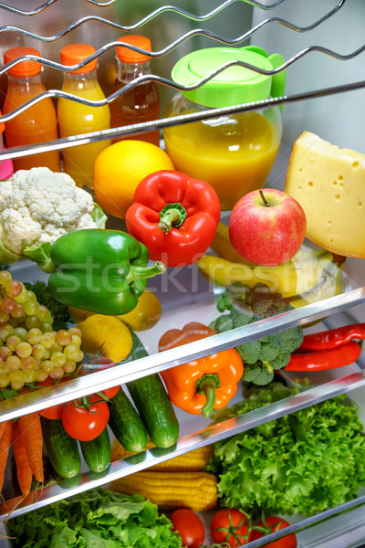 Stock photo: Open refrigerator filled with food