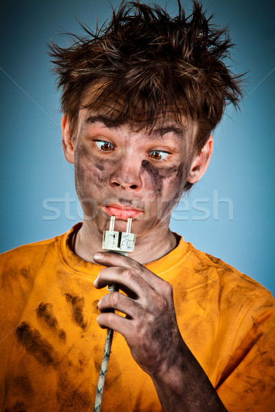 Elétrico choque menino homem cabelo fumar Foto stock © cookelma