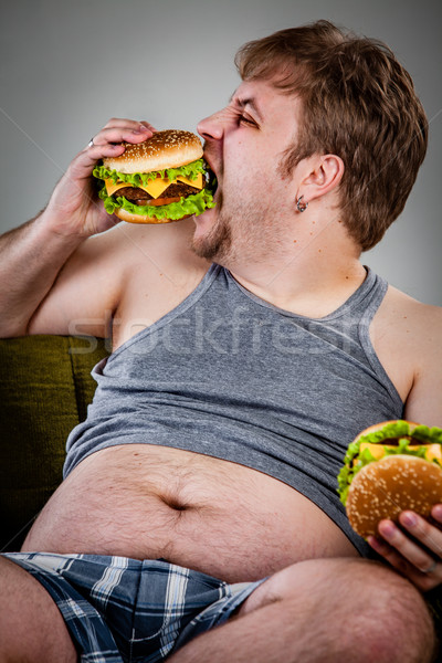 ストックフォト: 太った男 · 食べ · ハンバーガー · アームチェア · 食品