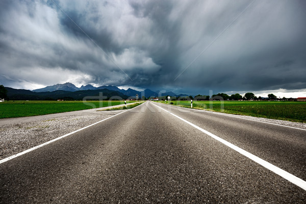 Road leading into a storm - Forggensee and Schwangau, Germany Ba Stock photo © cookelma