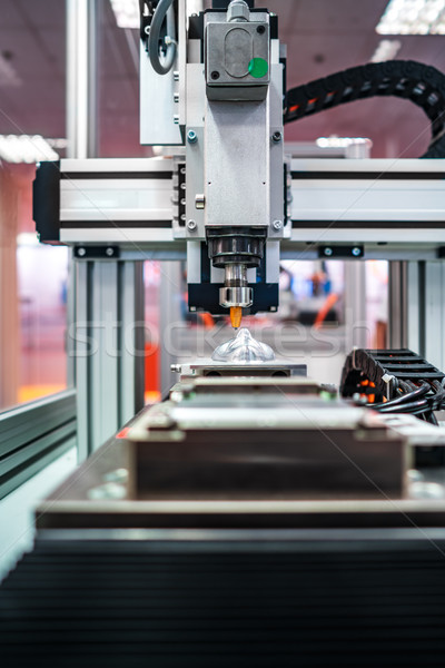 CNC Laser cutting of metal, modern industrial technology. Stock photo © cookelma