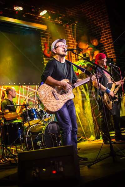 Band performs on stage in a nightclub Stock photo © cookelma