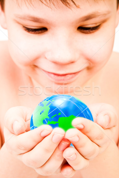 boy holds globe in hands Stock photo © cookelma