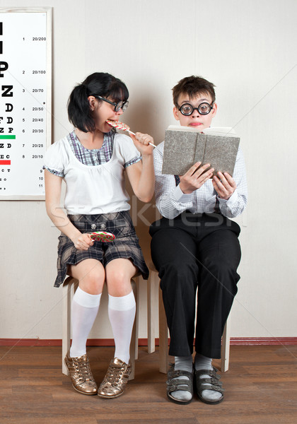 Two person wearing spectacles in an office at the doctor Stock photo © cookelma