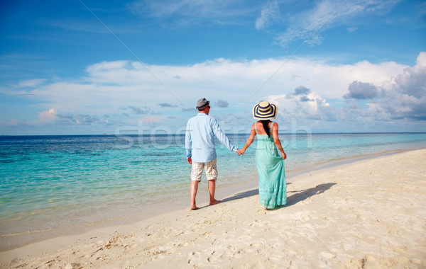 Vacances couple marche plage tropicale Maldives homme [[stock_photo]] © cookelma