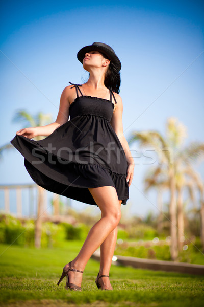 Kobieta dziewczyna czarna sukienka hat moda lata Zdjęcia stock © cookelma