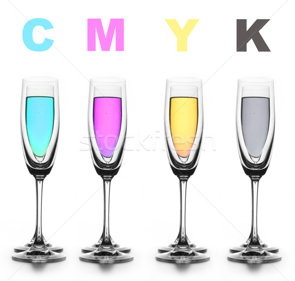 Four glasses with a different liquid on color. CMYK. Stock photo © cookelma