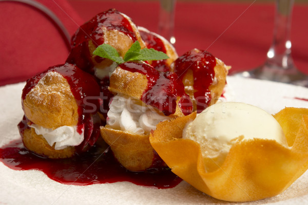 Tasty profiteroles on a dining table Stock photo © cookelma