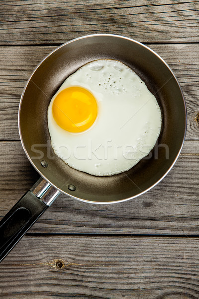 Frit oeufs table en bois déjeuner alimentaire cuisine [[stock_photo]] © cookelma