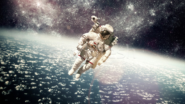 астронавт космическое пространство фон планете Земля Элементы изображение Сток-фото © cookelma