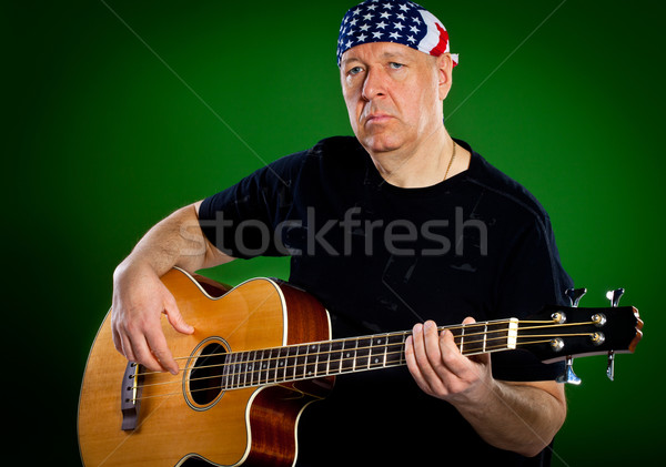 Hombre guitarra verde arte rock concierto Foto stock © cookelma