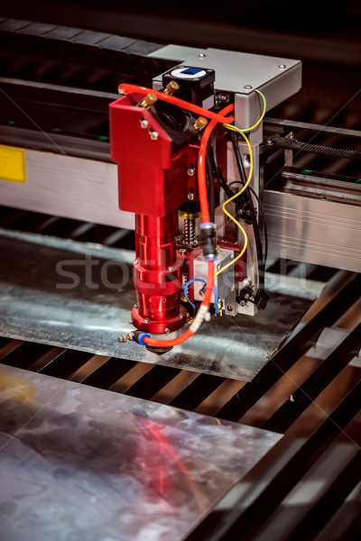 CNC Laser cutting of metal, modern industrial technology. Stock photo © cookelma