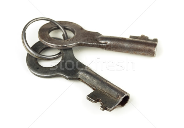 Oude sleutels twee sleutelhanger geïsoleerd witte Stockfoto © coprid